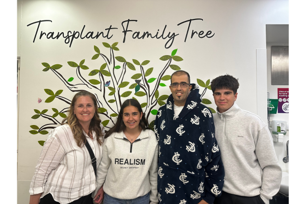 Frank with his family standing in-front of the 'Transplant Tree' at Austin Hospital